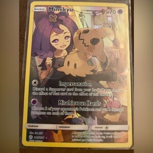 Pokemon Trading Card with Purple and Tan Design